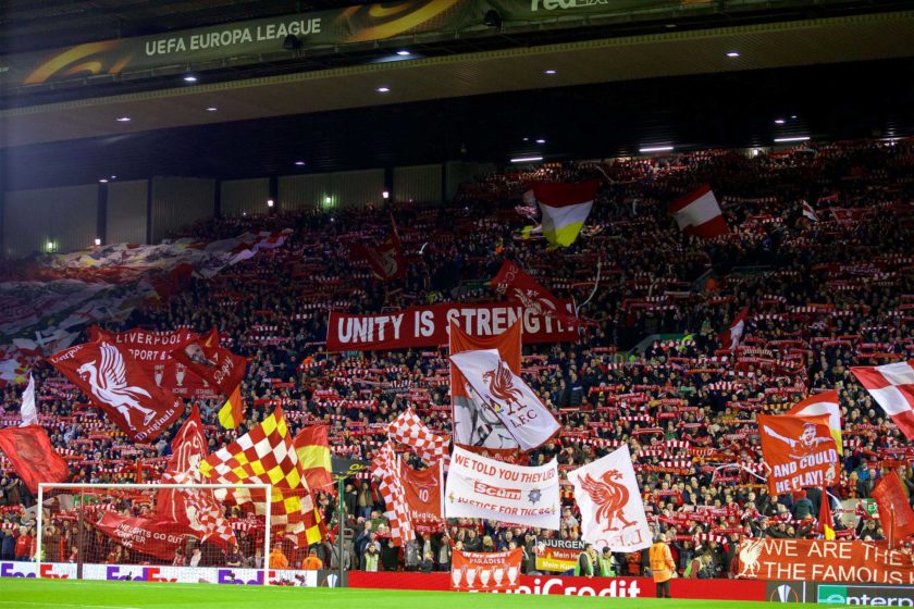 Fans at The Kop section of Anfield, united in passion and ready to support their team